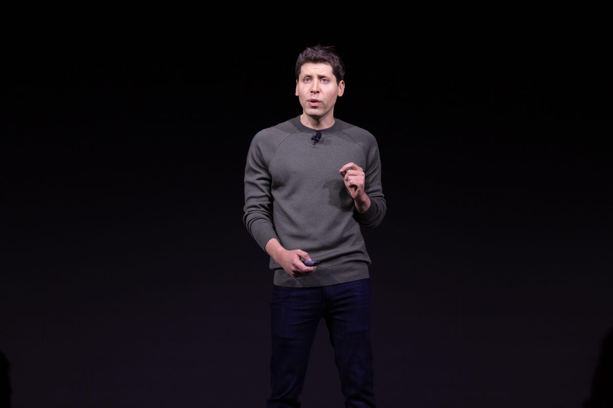 OpenAI CEO Sam Altman speaking at his company's DevDay event in 2023