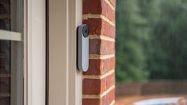 A Nest Doorbell (battery) installed on a house