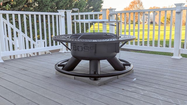 Black Fire pit with silver grill above