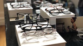 Multiple pairs of Roka Online Glasses are displayed on boxes.