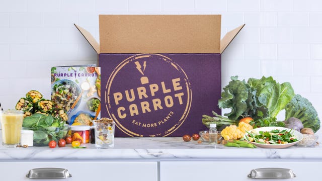 purple carrot meal kit on table next to box