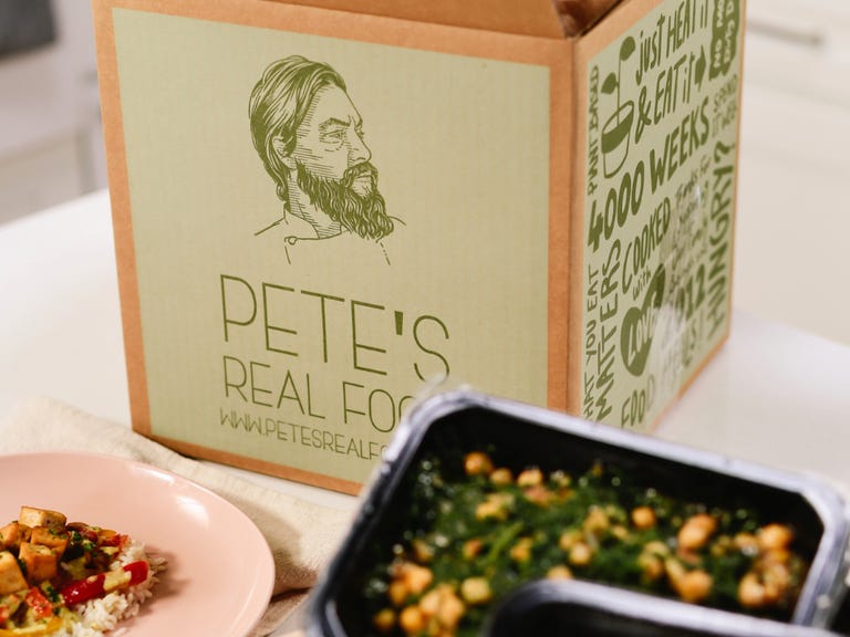 box of pete's food with meals in front